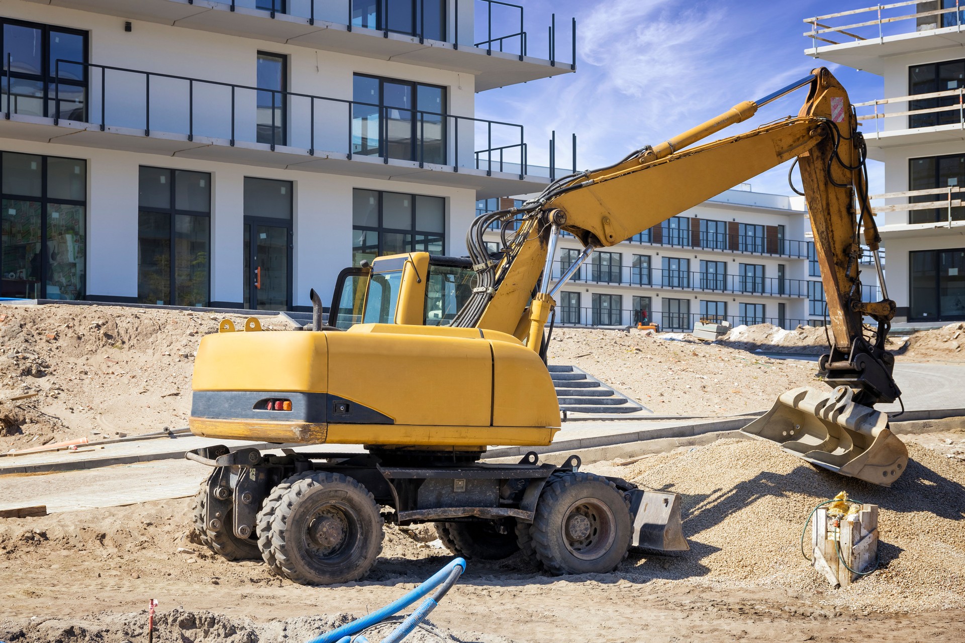 Construction machinery at the construction site of a housing estate